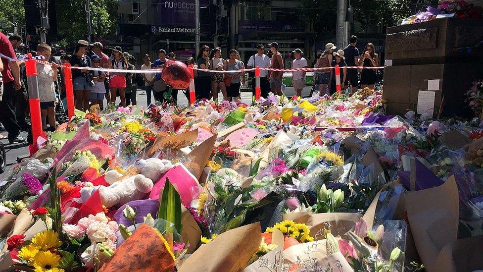 Flowers laid in Melbourne's Bourke St Mall after Friday's tragedy