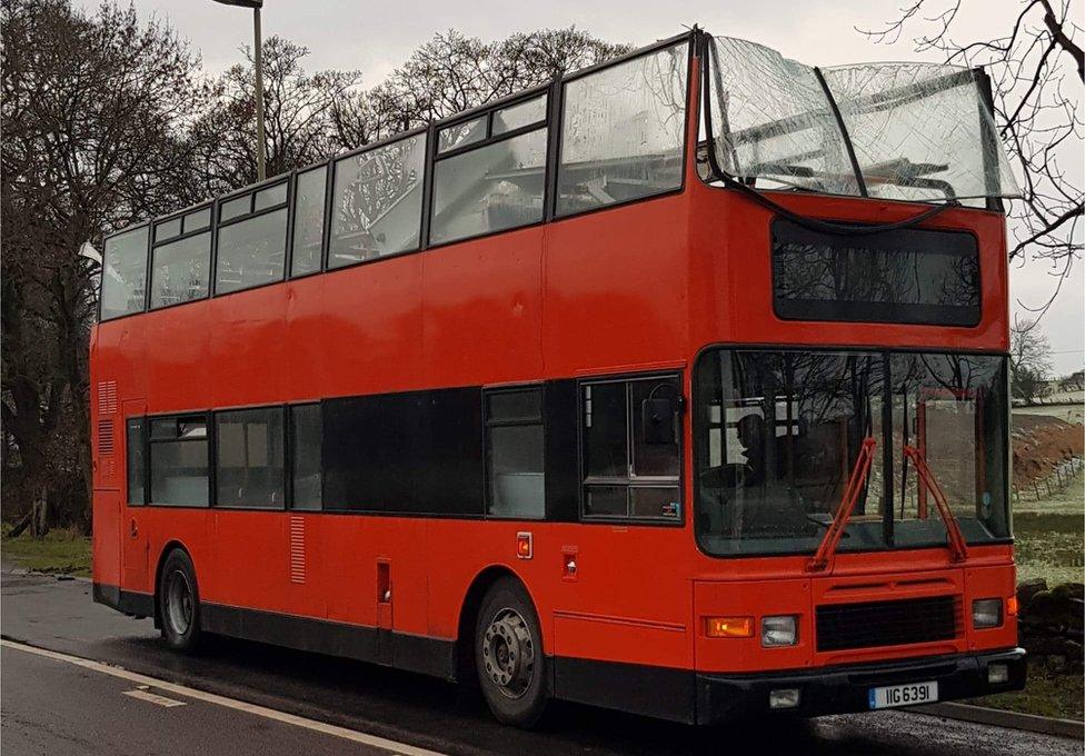 Bus with roof missing