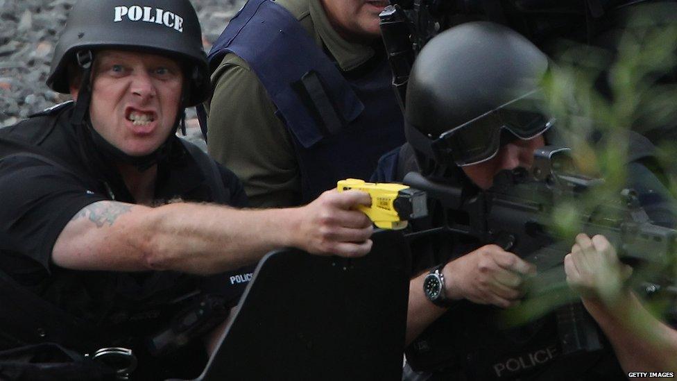 Police try to negotiate with Raoul Moat in the village of Rothbury in 2010