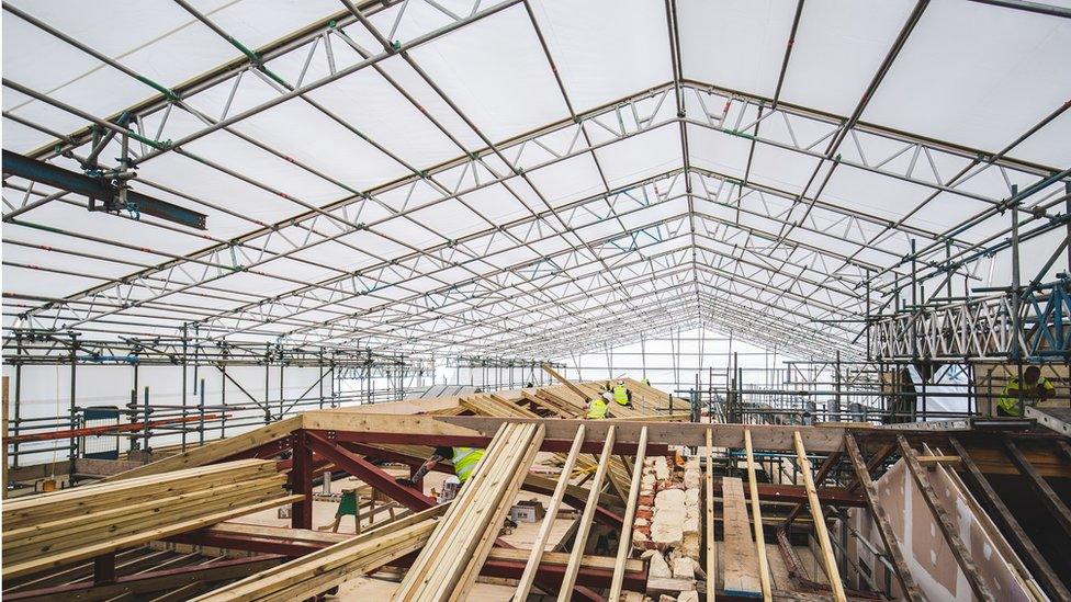 The glass roof being restored