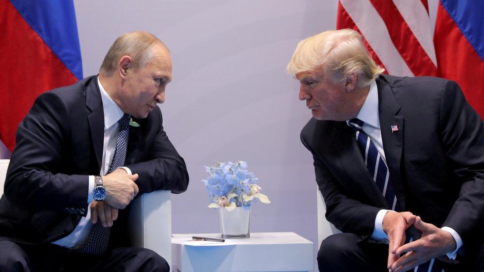 Russia's President Vladimir Putin talks to US President Donald Trump during their bilateral meeting at the G20 summit in Hamburg, Germany, July 7, 2017