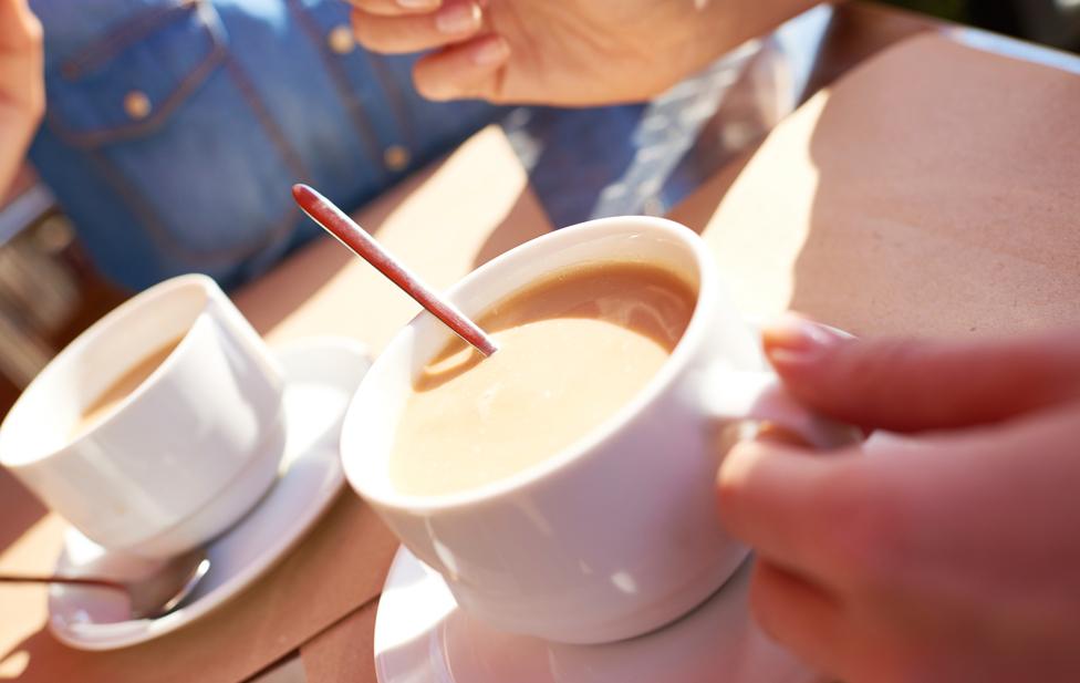 People drinking tea - detail