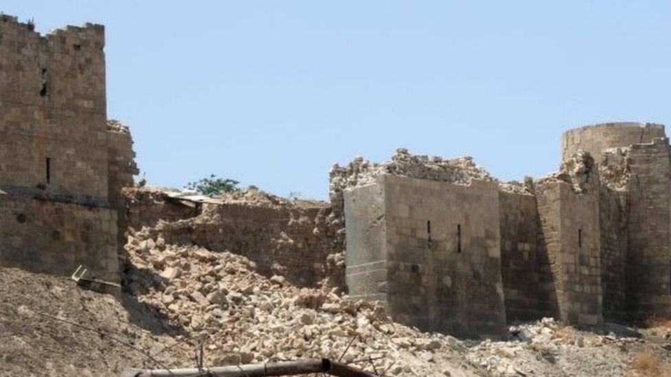 A damaged wall of Aleppo Citadel following a reported explosion the previous night in a tunnel near the monumental 13th-Century fortress. 12 July 2015