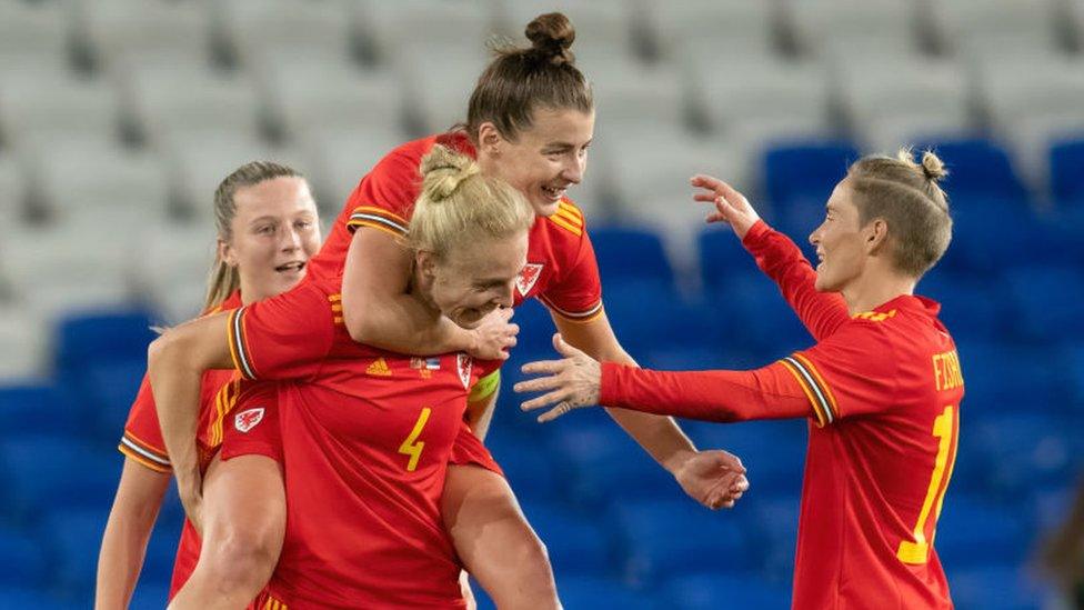 Wales women's team celebrating a goal