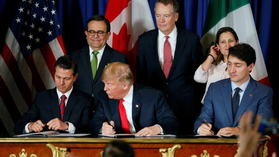 US President Donald Trump, Mexico President Enrique Pena Nieto and Canada Prime Minister Justin Trudeau attend USMCA signing ceremony