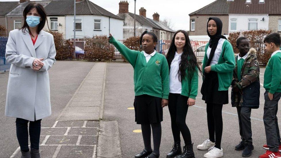 Children in playgrounds in schools