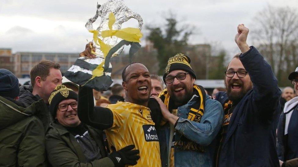 Maidstone United captain Gavin Hoyte celebrates winning in the third round of the FA Cup