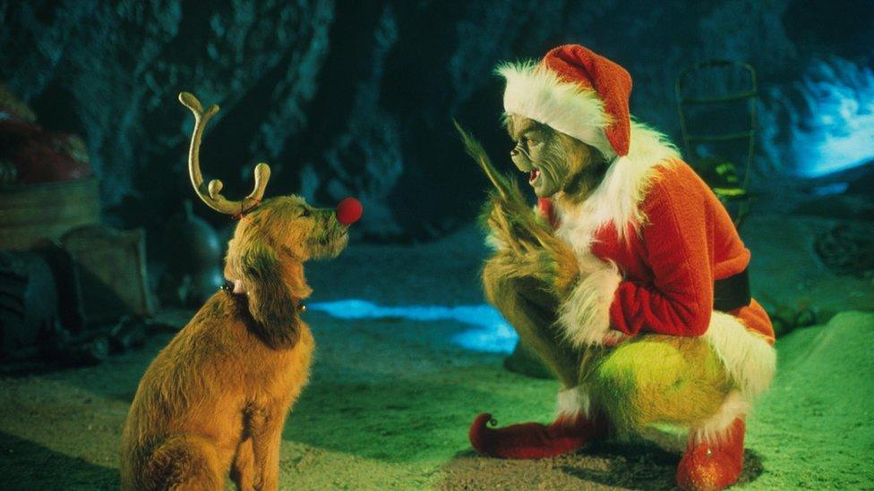 Jim Carrey as The Grinch