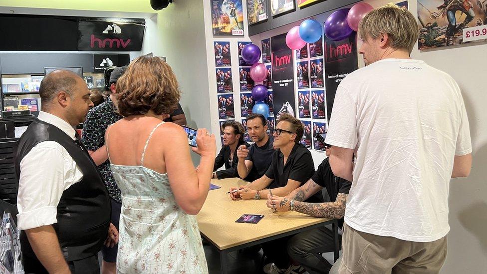 Fans meeting McFly in HMV in Chelmsford