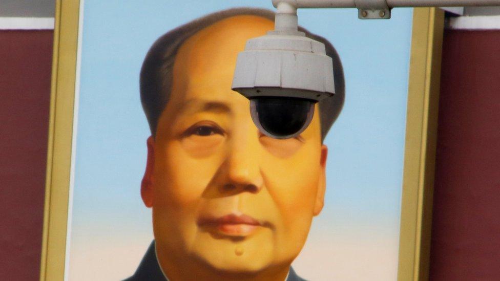 A security camera overlooks Tiananmen Square in front of a portrait of the late Chinese Chairman Mao Zedong in Beijing, China on 6 March 2018.