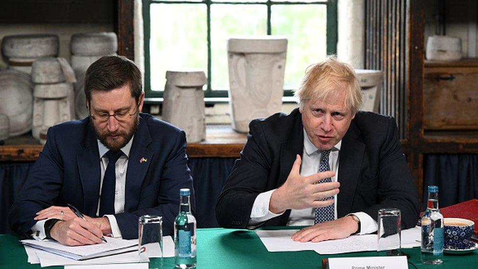 Simon Case and Boris Johnson