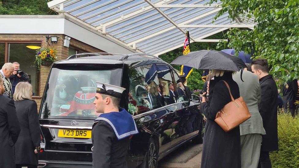 Funeral cortege arriving at crematorium in Harlow