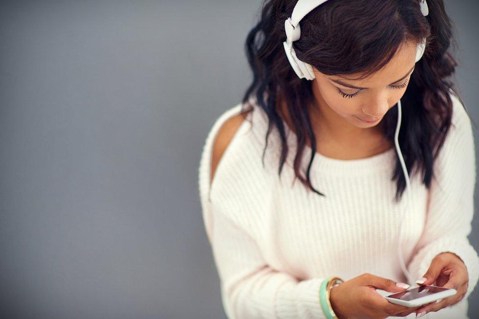 Woman with headphones on