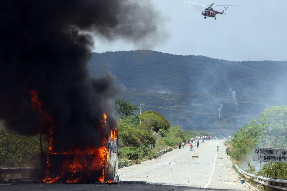 Mexican federal police clash with teachers during a protest against an education reform and the arrest of two of its leaders, in Oaxaca State, on June 19, 2016.