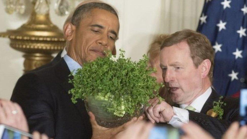 Enda Kenny presents President Obama with a bowl of shamrocks