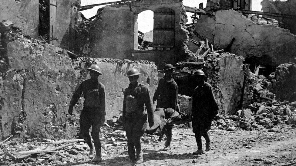 Members of the Medical Corps removing the wounded from Vaux, France. July 22, 1918. NARA FILE #: 111-SC-16352