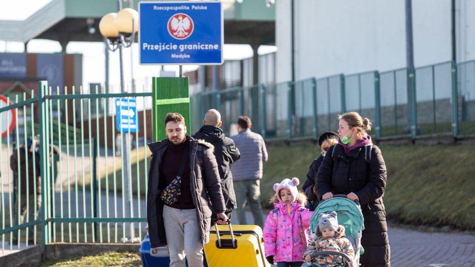 The first migrants from Ukraine have begun entering Poland after Russia bombarded Ukrainian territory