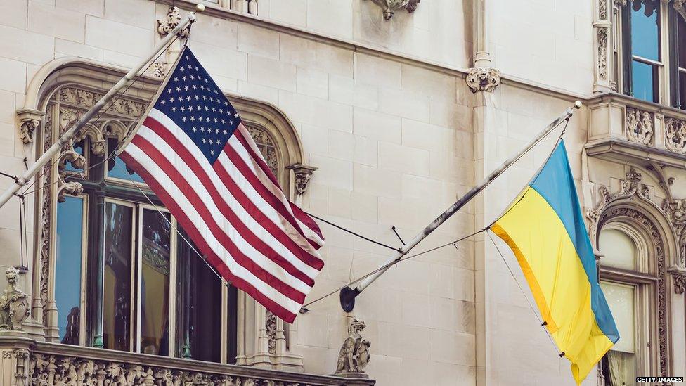 Ukraine flag flies beside an American flag in New York City