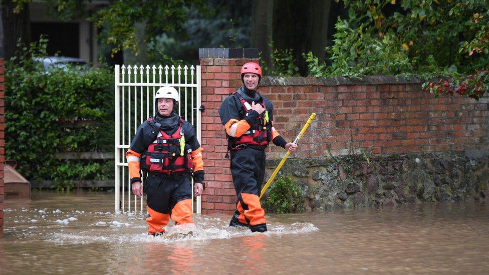 Emergency-services-help-people-who-are-in-trouble-following-the-floods.