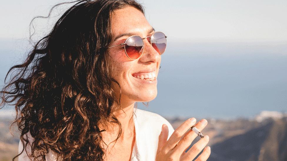 Woman smoking cannabis