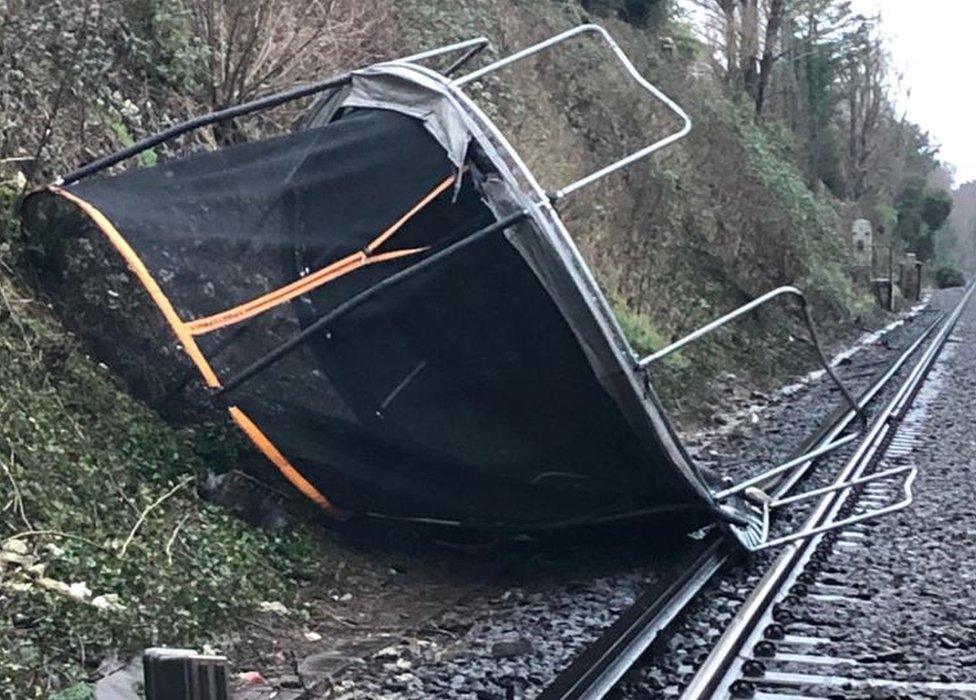 A trampoline on train tracks