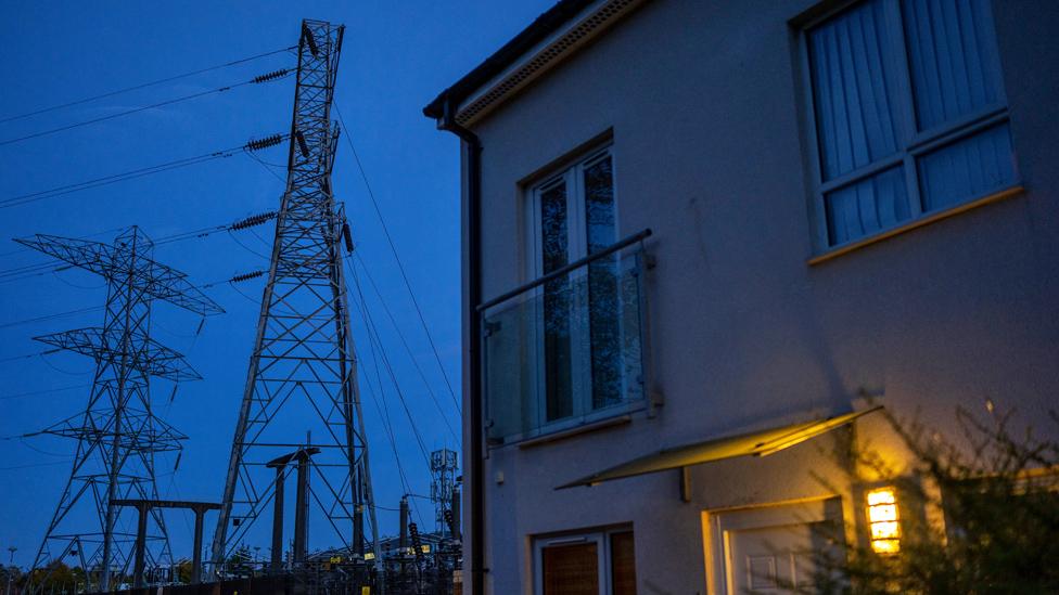 Electricity pylons near a house in Manchester