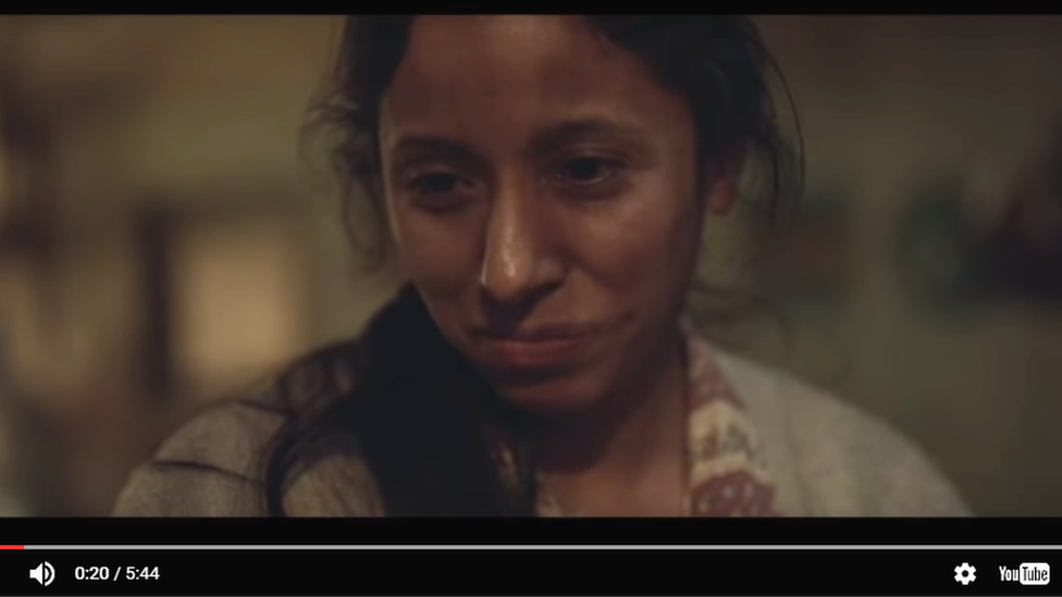 still from advert showing the woman in the 84 lumber ad