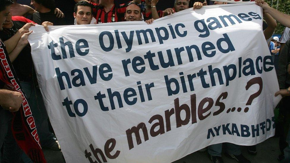 AC Milan fans during a 2007 game with Liverpool, hold up a banner asking why the Parthenon Marbles have not been returned to Greece