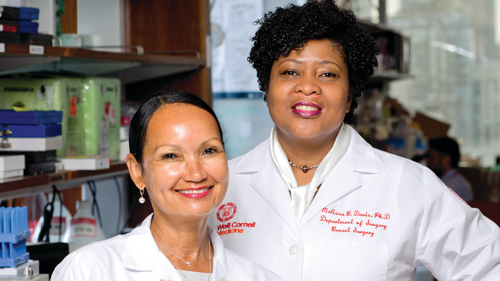 Two researchers from Weill Cornell Medicine standing next to each other