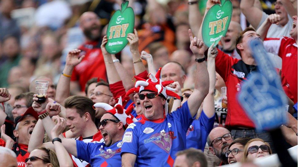 Salford Red Devil fans celebrate during the Dacia Magic Weekend match at St James' Park