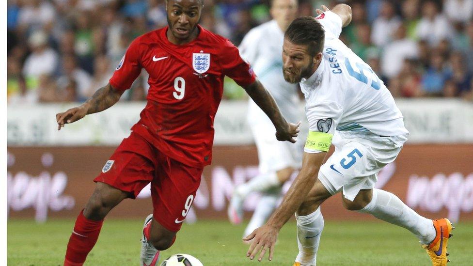 Raheem Sterling against Slovenian"s Bostjan Cesar