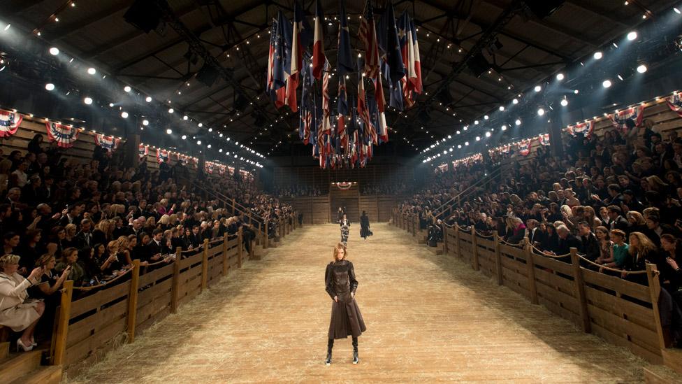 Models walk the runway during the Chanel "Metiers d'Art" Show at Fair Park on December 10, 2013 in Dallas, Texas