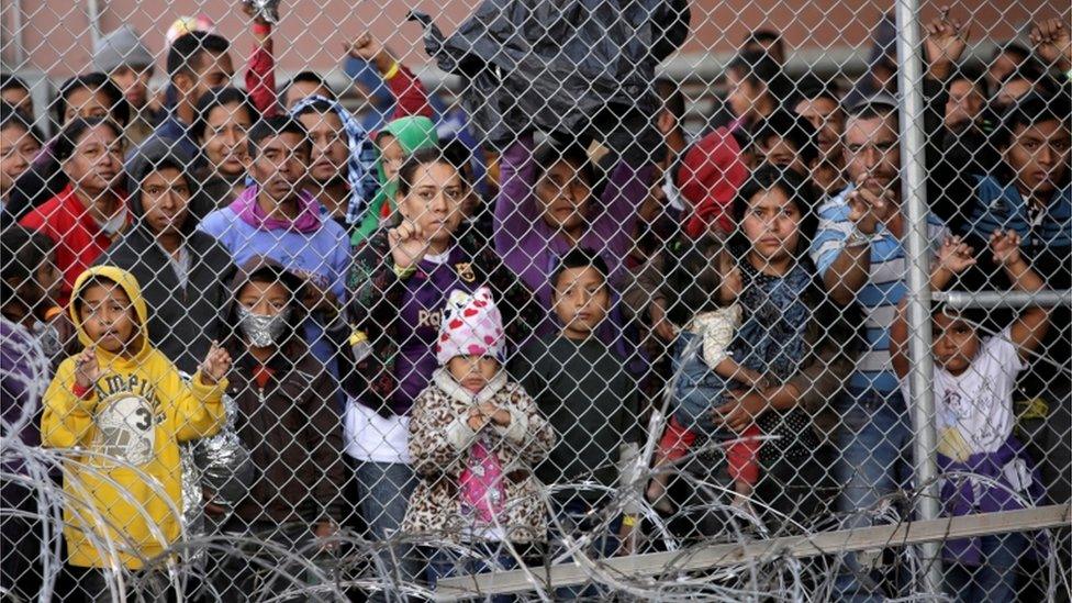 Central American migrants are seen inside an enclosure where they are being held by U.S. Customs and Border Protection (CBP), after crossing the border between Mexico and the United States illegaly and turning themselves in to request asylum, in El Paso, Texas