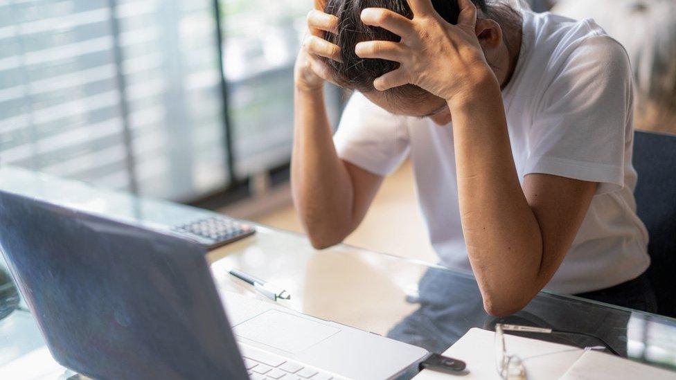 Stressed laptop user