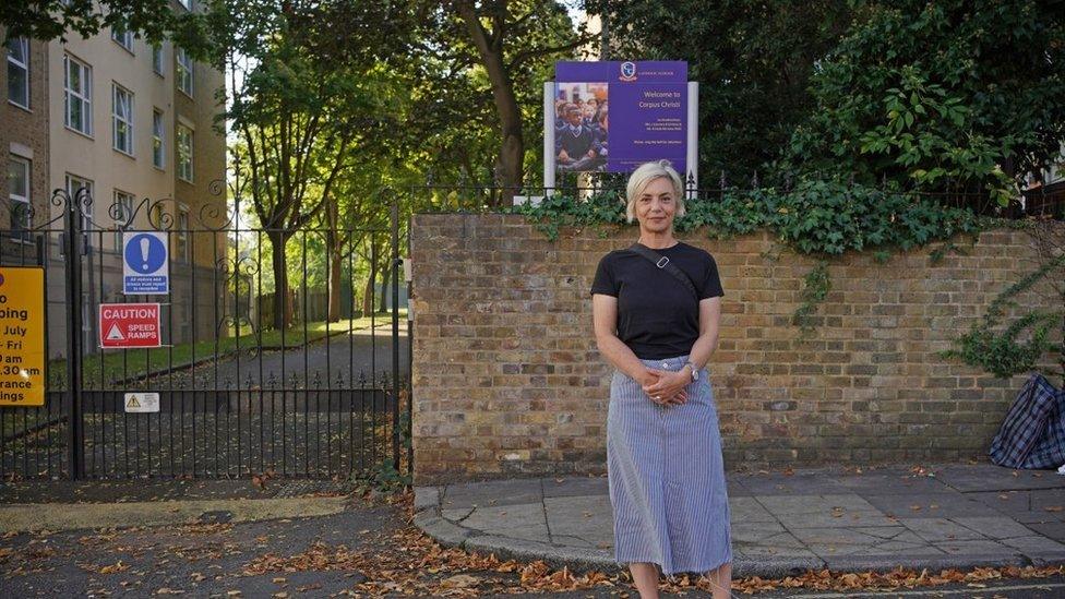 Miranda Sawyer stands outside the gates to St Martin in Tulse Hill, Lambeth.