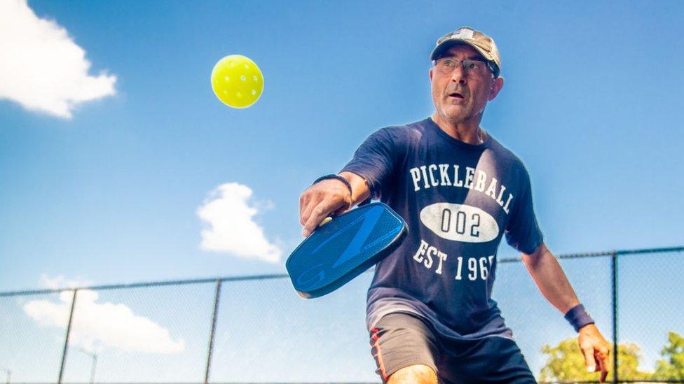 Man playing Pickleball