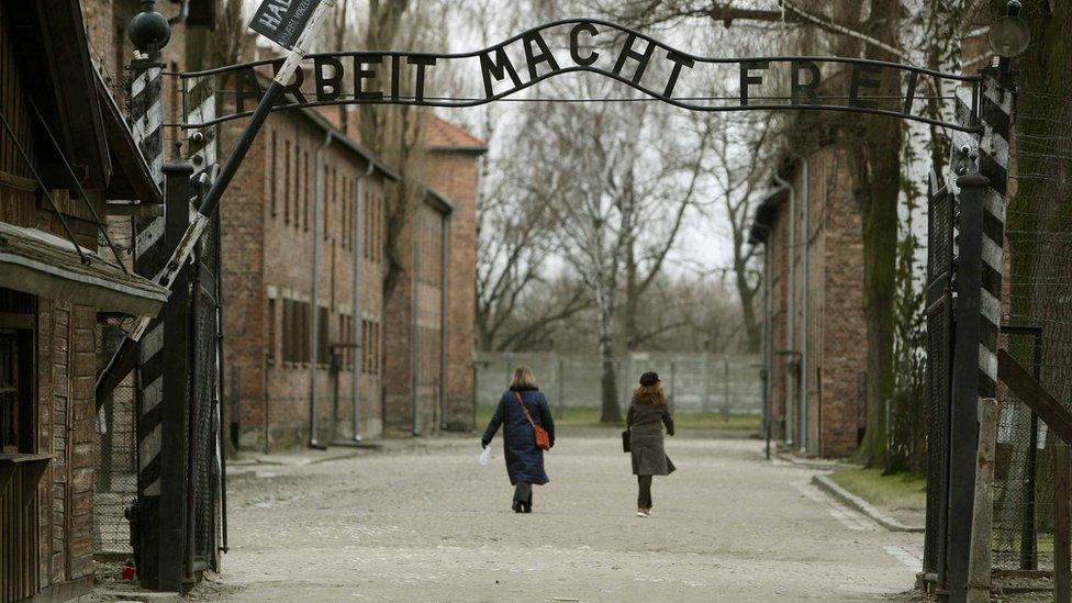 The gates at Auschwitz I camp, with the infamous inscription "Arbeit Macht Frei" - work will set you free