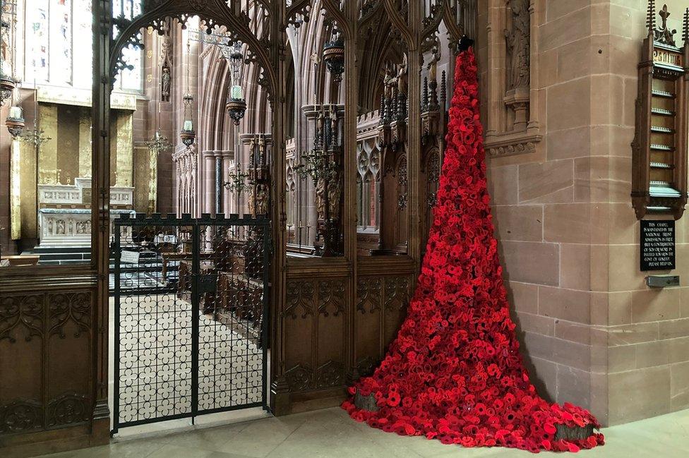 Cascading poppy display inside the chapel at Clumber Park