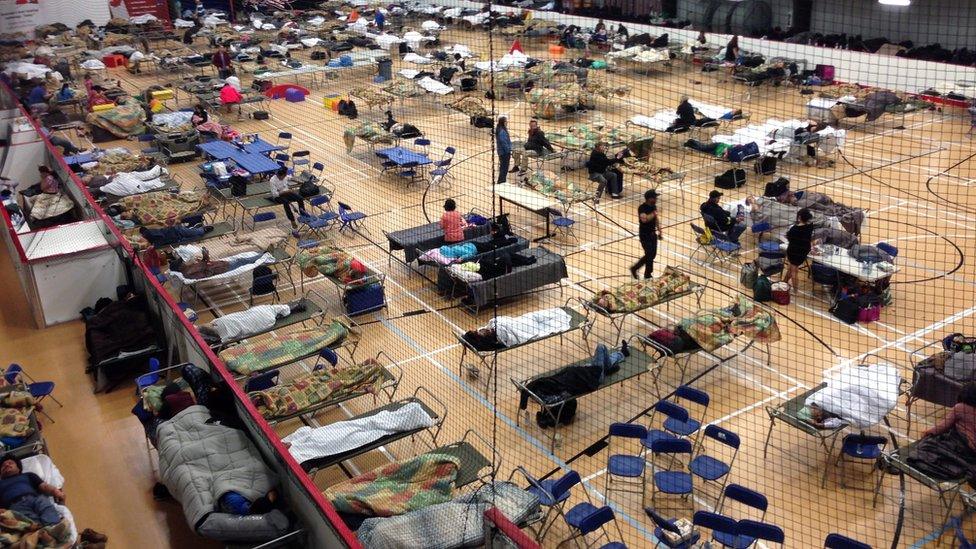 Cots are set up on the gym floor at an evacuee reception center, operated by the regional municipality of Wood Buffalo in Anzac, Alberta, Canada on Wednesday, May 4, 2016.