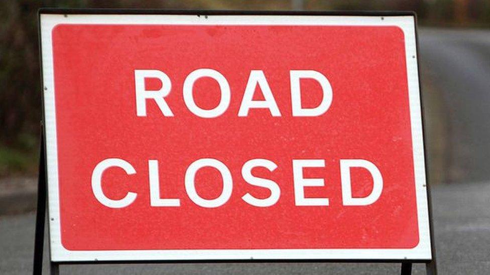 A road closed sign