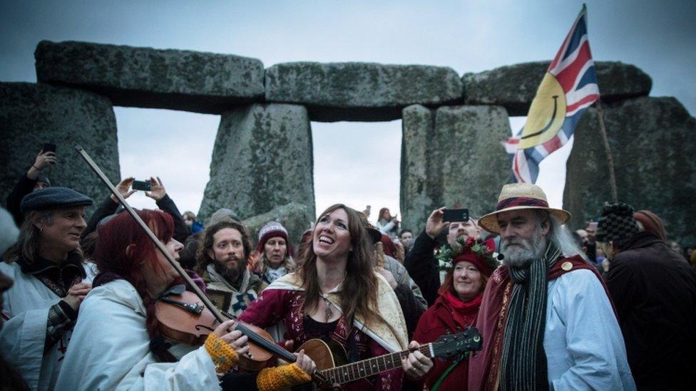 Thousands of people gathered at Stonehenge in Wiltshire to watch the sun rise on the shortest day of the year.