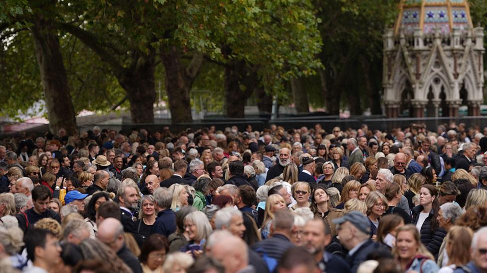 Queue in Victoria Gardens near Westminster Hall