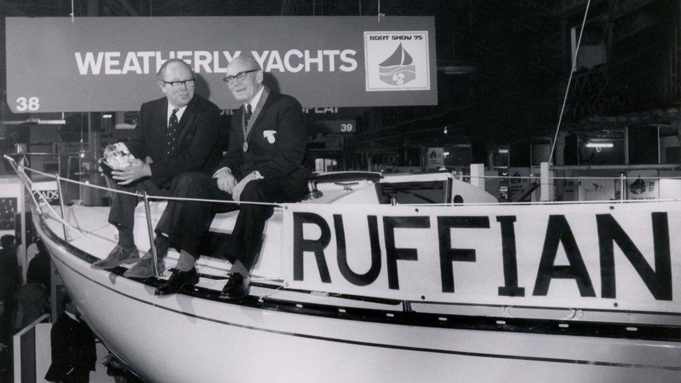 Black and white photo of Billy and Dickie Brown sat on a Ruffian 23