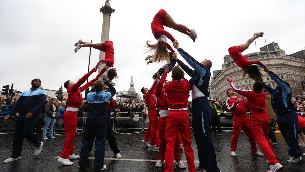 Members of the Varsity All American Cheerleaders perform