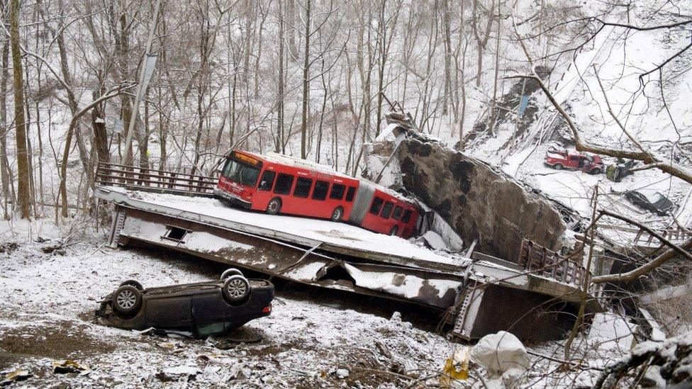 A photo of the collapsed Fern Hollow Bridge