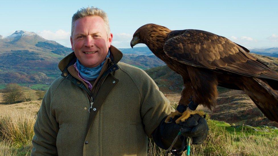 Countryfile Winter Diaries presenter with a golden eagle.