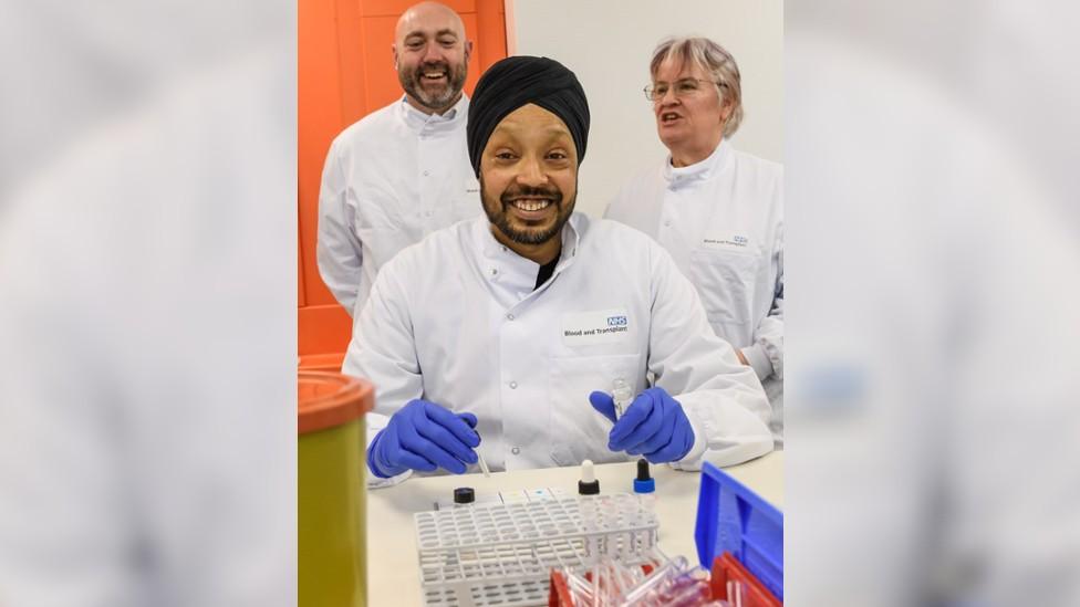 Rajpal Singh trying out the real blood matching equipment