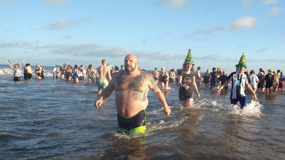 Swimmers braving the North Sea