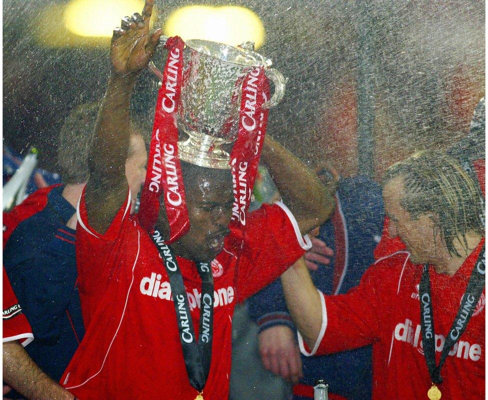 George Boateng and Bolo Zenden celebrate winning the Carling Cup Final football match against Bolton 29 February, 2004 in Cardiff