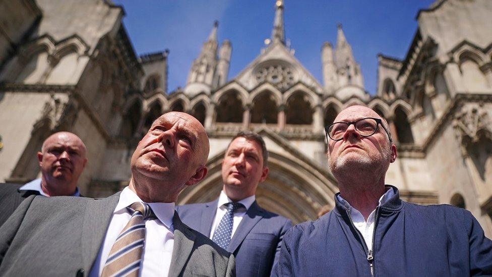 Barry McCaffrey and Trevor Birney outside the Royal Courts in London